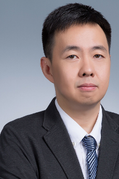 A picture of Prof. Man Guo.